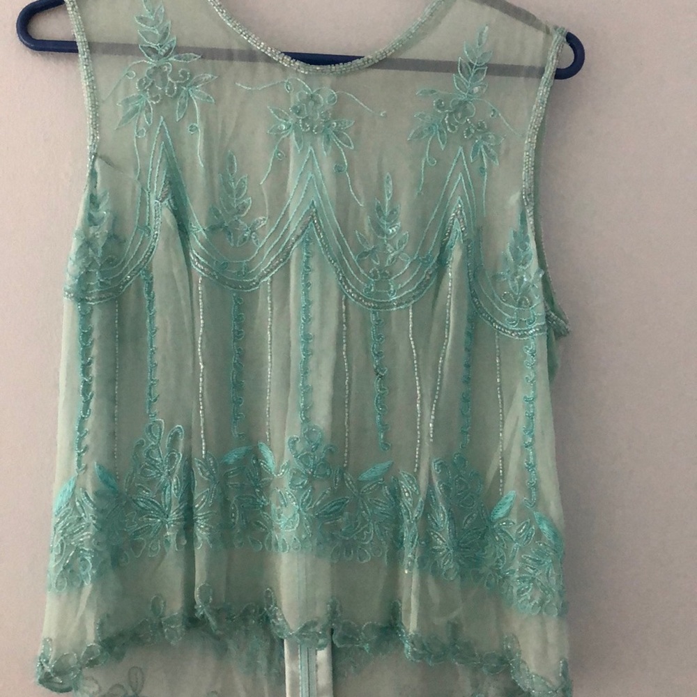 Opaque top with sequin and beaded detail